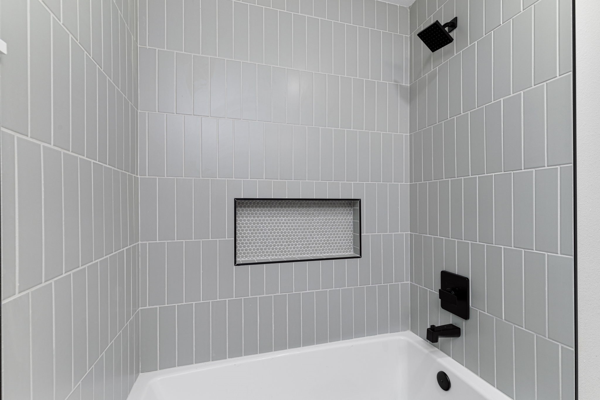 5605 Overbrook Drive Austin, TX 78723 - Photo 28 of 37 a bathroom with a bathtub
