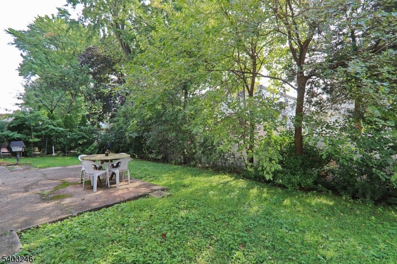 726 Gates Terrace, Unit 2 Union, NJ 07083 - Photo 24 of 25 a view of a chair and table in the garden