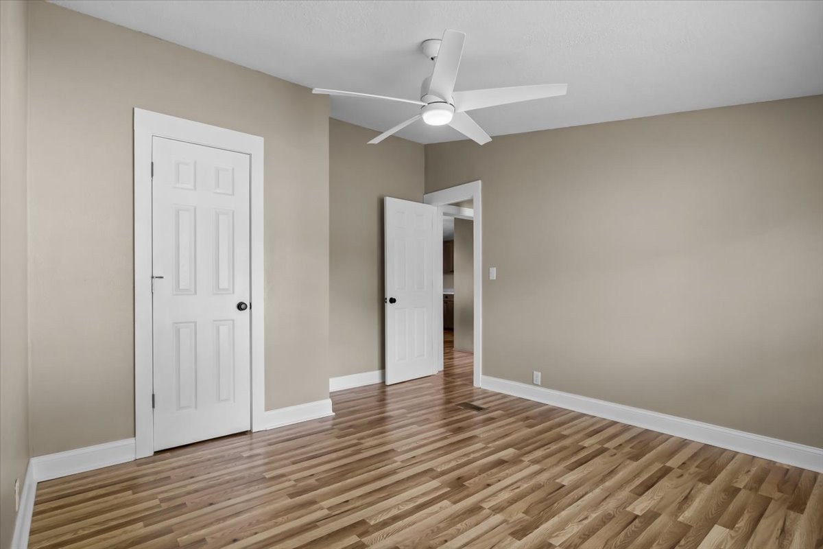 1112 Garners Creek Road Dickson, TN 37055 - Photo 16 of 57 a view of an empty room with wooden floor