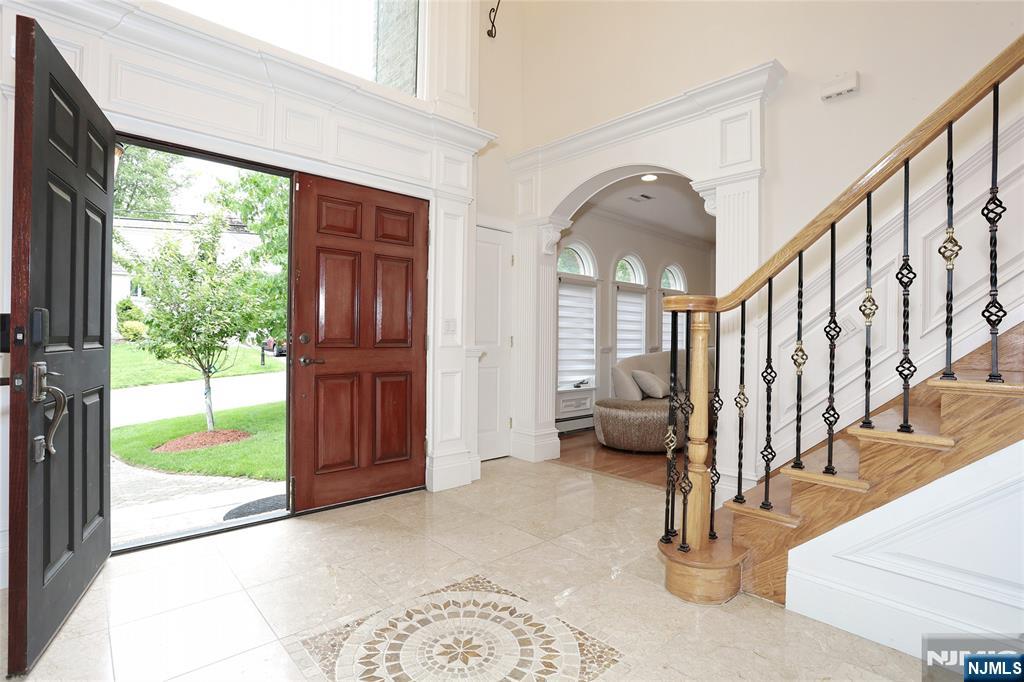65 Ross Avenue Demarest, NJ 07627 - Photo 4 of 48 a view of an entryway with livingroom