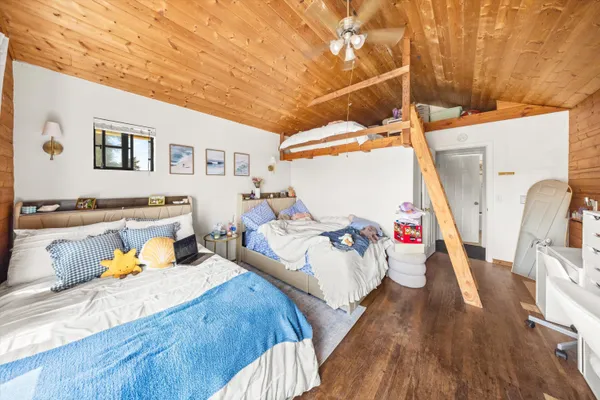 a bed room with a bed and a couch