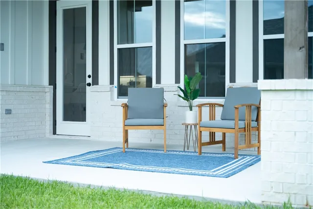 a kitchen with kitchen island a sink stove and wooden floor