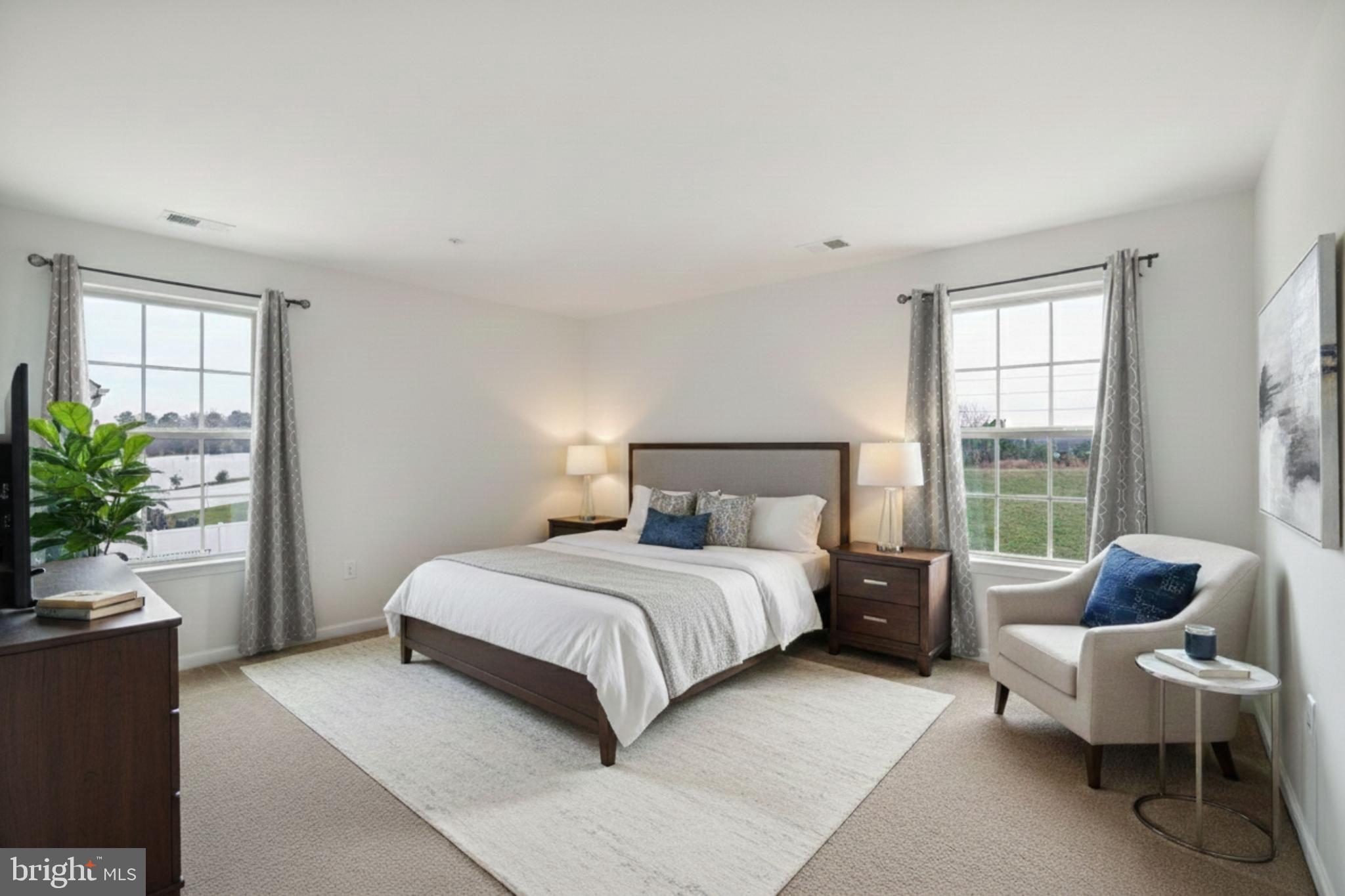 14333 Owings Avenue Brandywine, MD 20613 - Photo 6 of 16 a bedroom with a bed and a couch