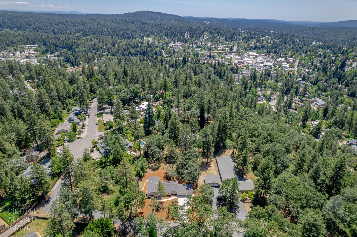 280 Jan Road Grass Valley, CA 95945 - Photo 56 of 66 an aerial view of a house with a yard and mountain view