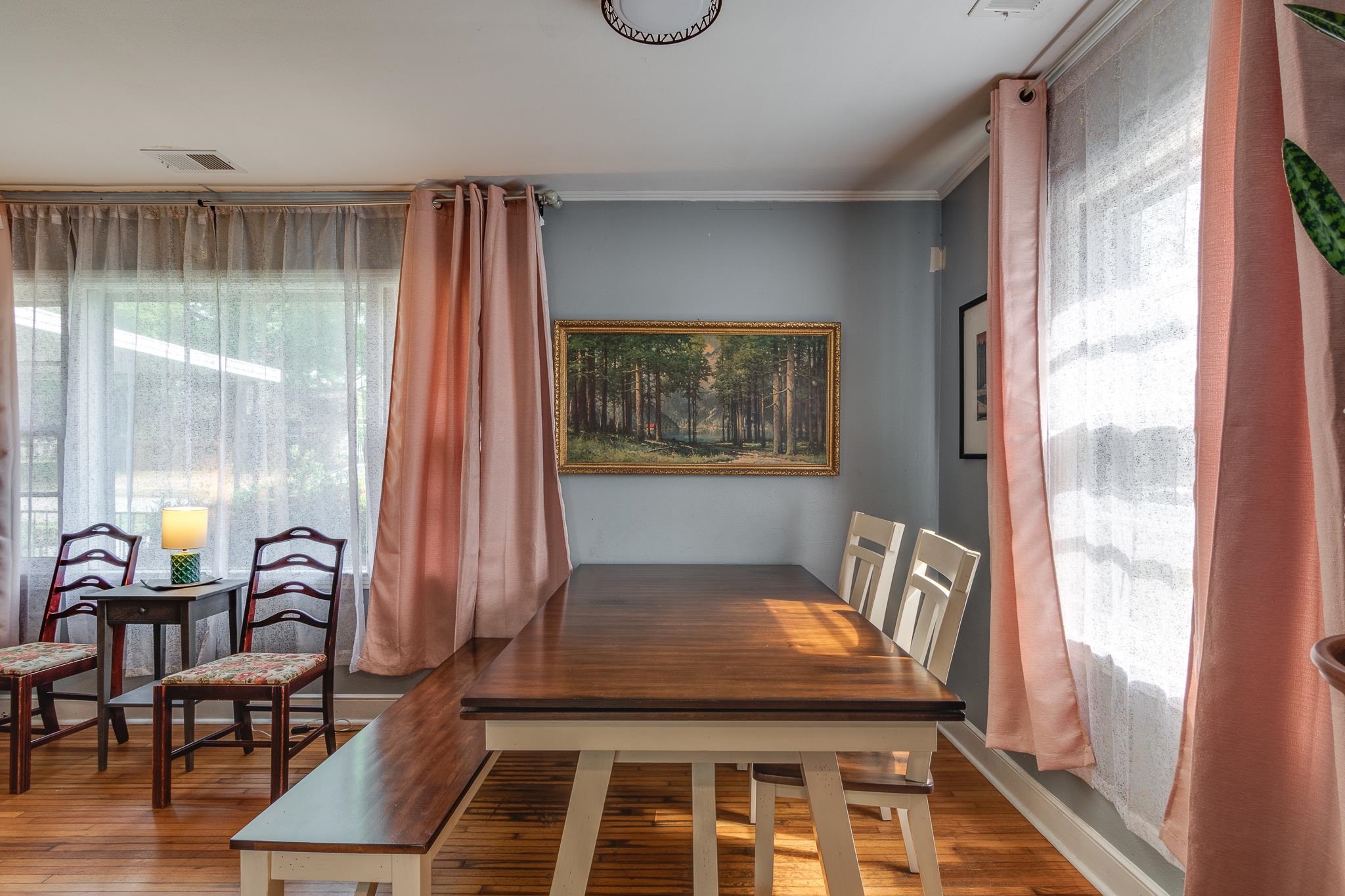 4661 Lynn Road Memphis, TN 38122 - Photo 11 of 32 a view of a dining room with furniture window and wooden floor