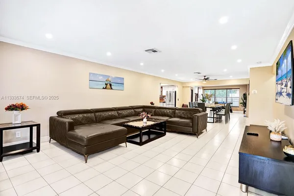 a living room with furniture and a couch