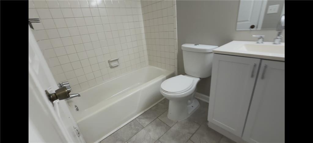 2563 Terrace Trail Decatur, GA 30035 - Photo 5 of 14 a white toilet sitting next to a bath tub