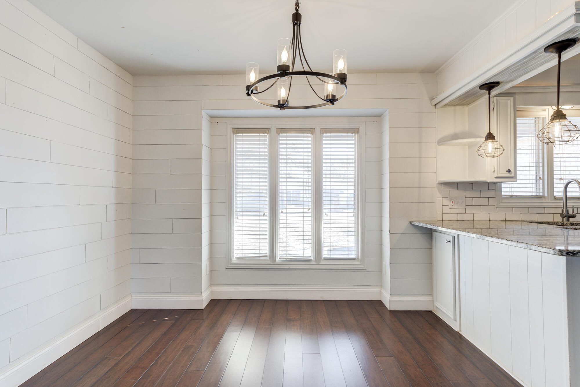 5604 70th Street Lubbock, TX 79424 - Photo 7 of 49 a very nice looking room with wooden floor and a window