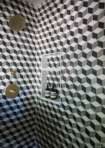 a bathroom with a black and white checkered checkered floor