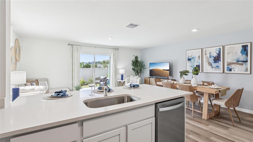 6546 Southwest 82nd Loop Ocala, FL 34476 - Photo 5 of 23 a kitchen with a sink and cabinets