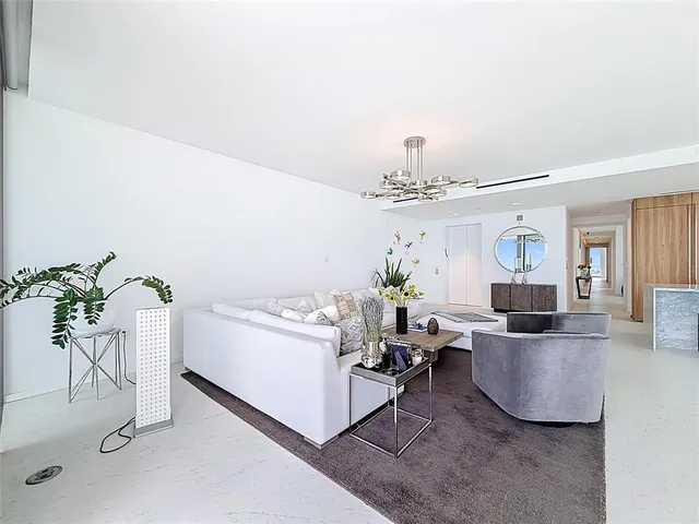 a bed room with a bed and a flat screen tv