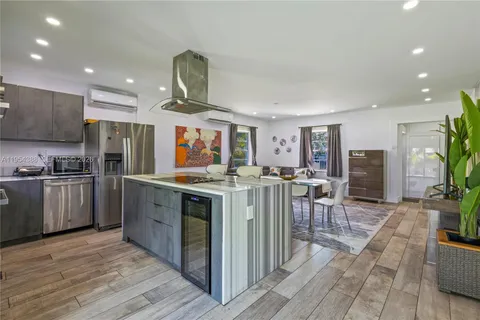 a kitchen with lots of counter top space and appliances