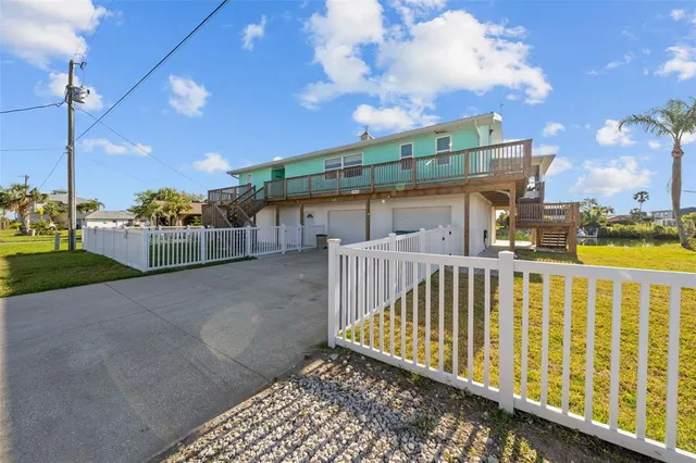 a view of a porch with a yard