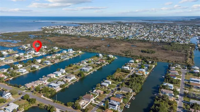 an aerial view of multiple houses with outdoor space