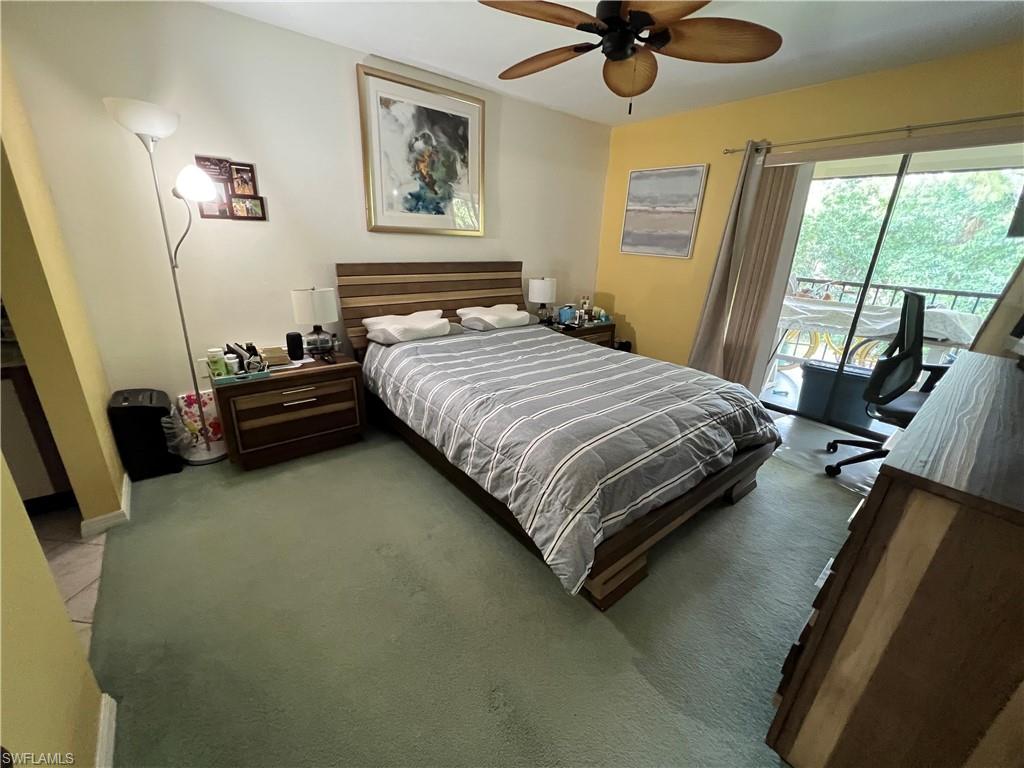 Undisclosed Address Naples, FL 34116 - Photo 11 of 14 a bedroom with a bed and window