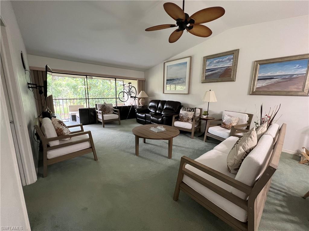 Undisclosed Address Naples, FL 34116 - Photo 5 of 14 a living room with furniture and a large window