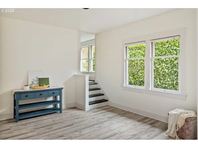 a view of livingroom with furniture and stairs