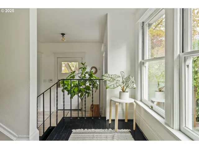 a view of balcony and wooden floor