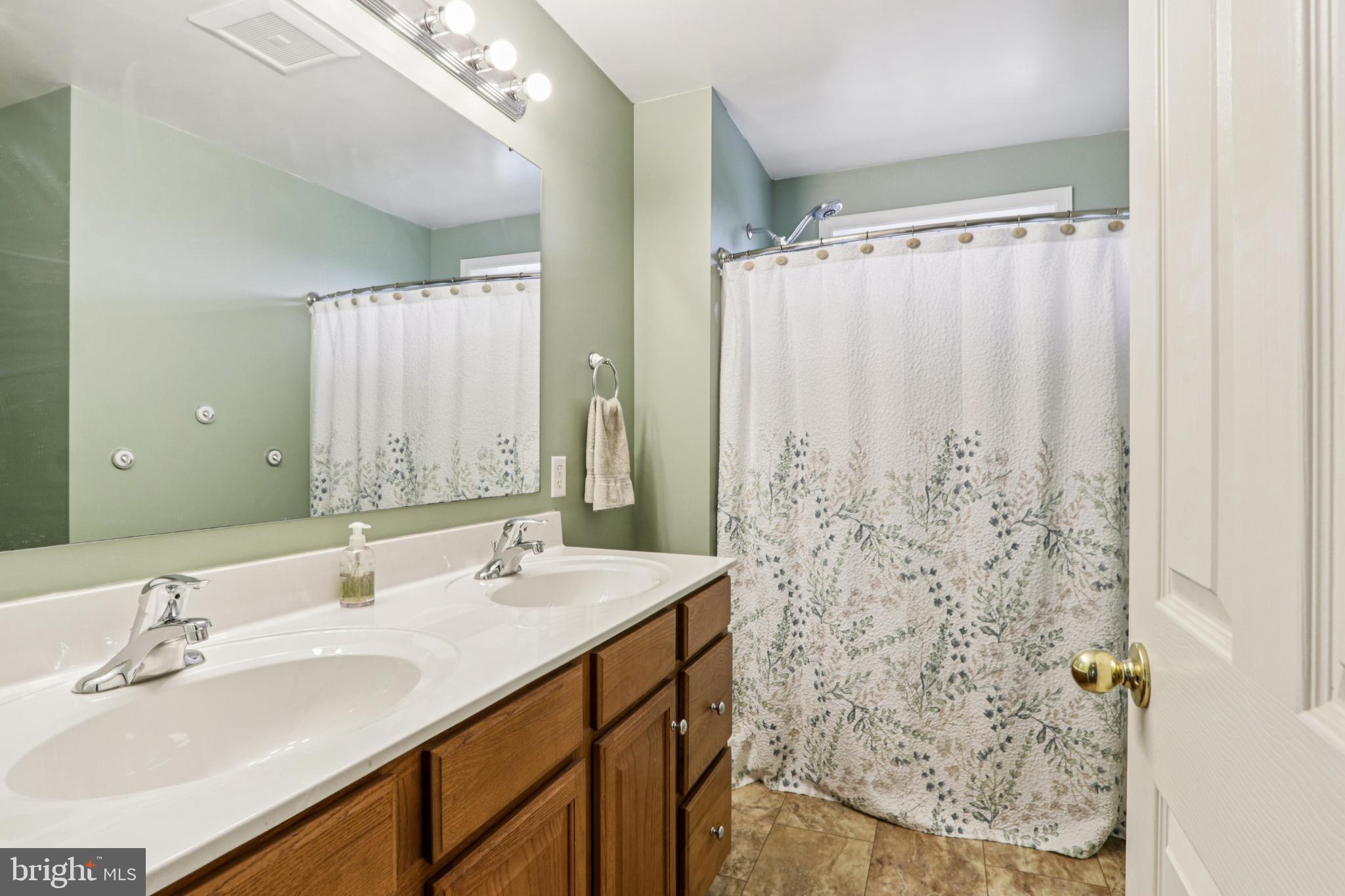 506 Stony Run Road Spring City, PA 19475 - Photo 40 of 74 Serene bathroom with natural accents.