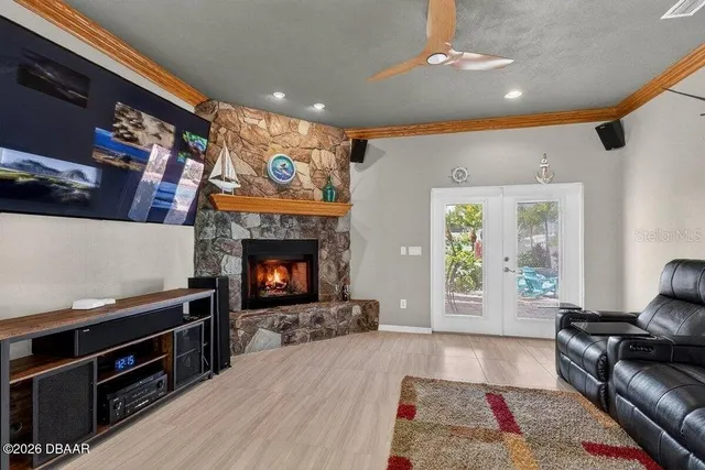 a living room with furniture and a fireplace