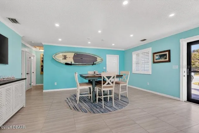 a view of a dining room with furniture