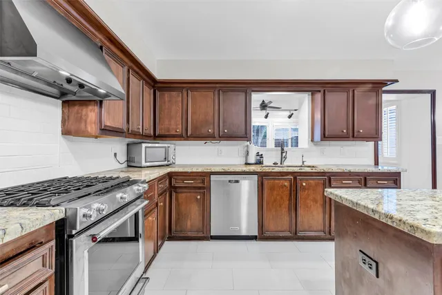 a view of an empty room and closet area
