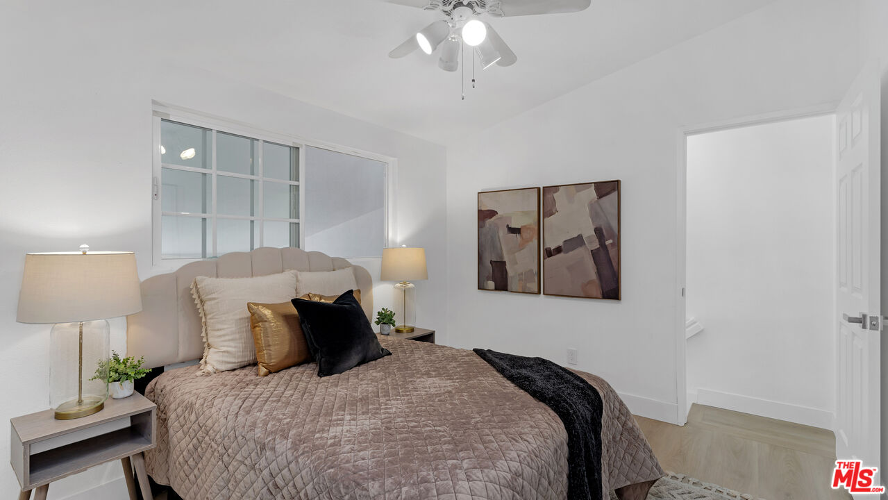 19431 Rue De Valore, Unit 41M Foothill Ranch, CA 92610 - Photo 16 of 23 a bed room with a bed and a painting