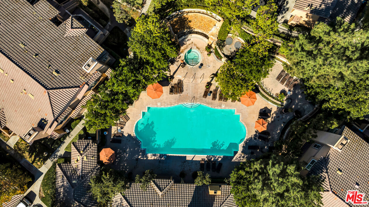 19431 Rue De Valore, Unit 41M Foothill Ranch, CA 92610 - Photo 20 of 23 an aerial view of a house with a garden