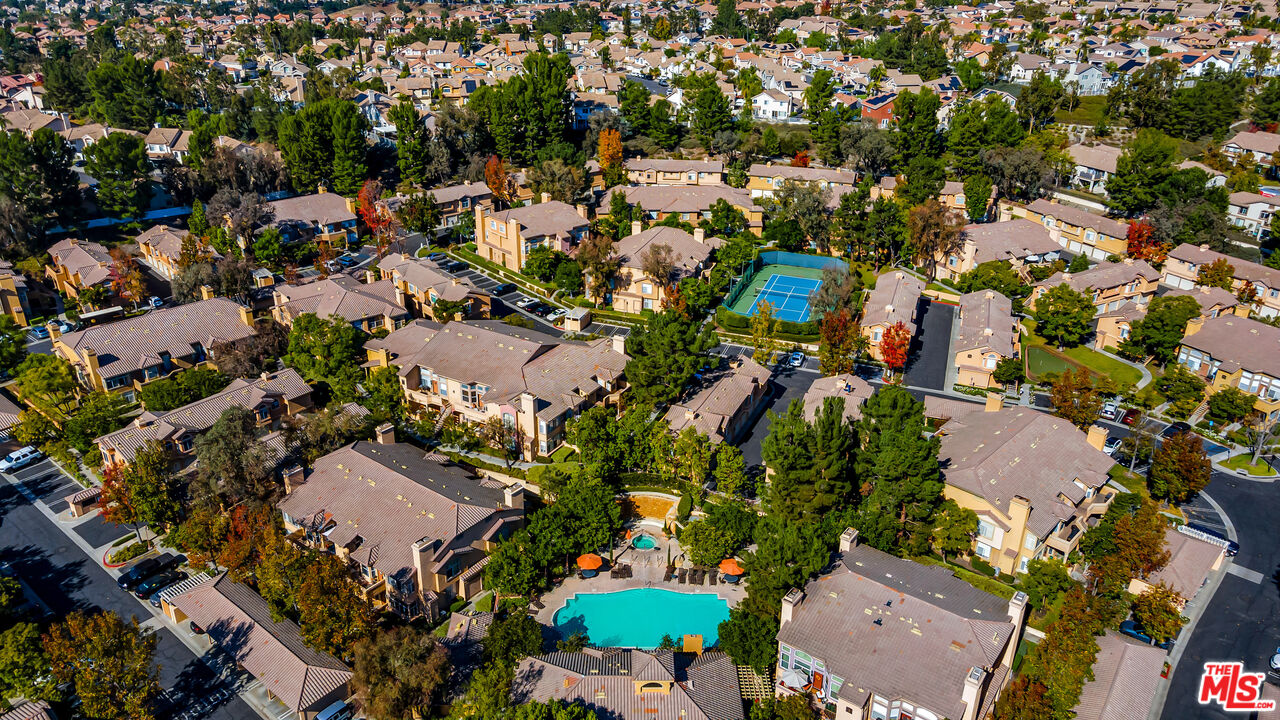 19431 Rue De Valore, Unit 41M Foothill Ranch, CA 92610 - Photo 22 of 23 an aerial view of residential houses with outdoor space and trees all around