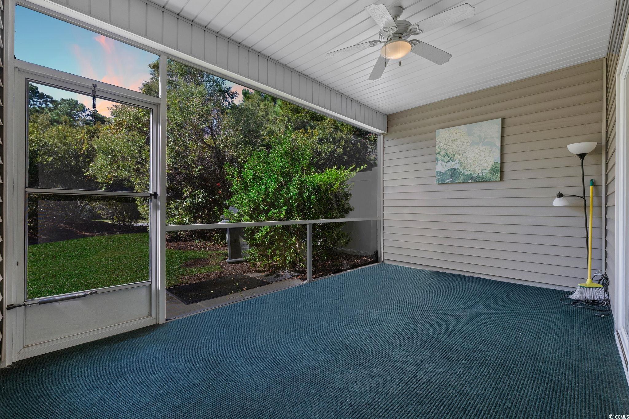817 Arezzo Way, Unit 1001 Myrtle Beach, SC 29579 - Photo 33 of 40 Unfurnished sunroom with ceiling fan
