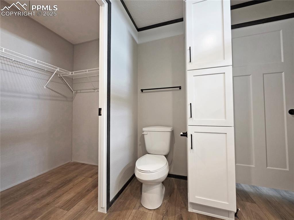 6685 Ramah Highway Yoder, CO 80864 - Photo 19 of 30 a bathroom with a toilet and a shower
