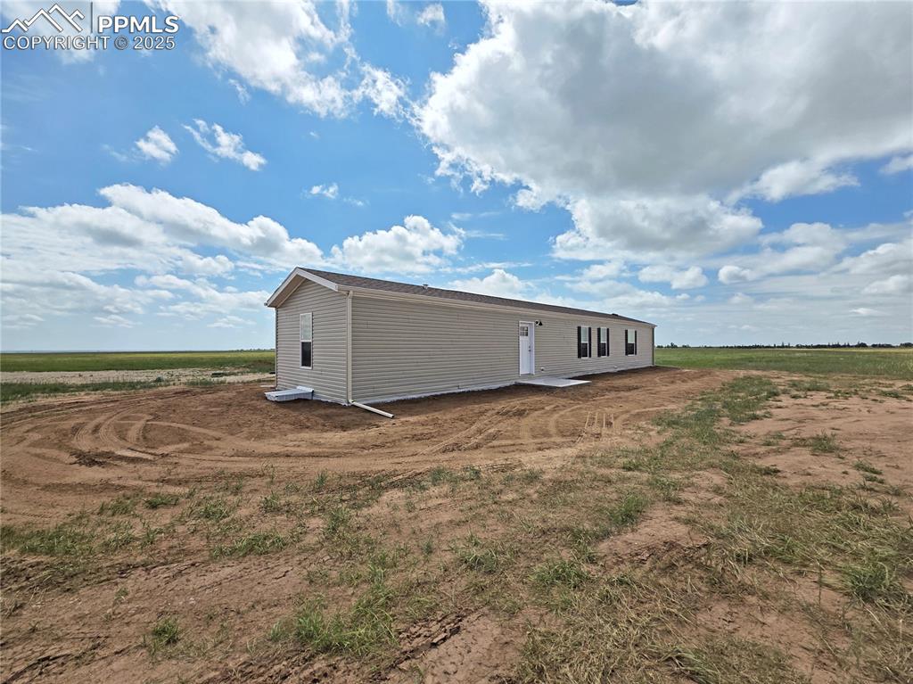6685 Ramah Highway Yoder, CO 80864 - Photo 2 of 30 a view of a big room with table and chairs