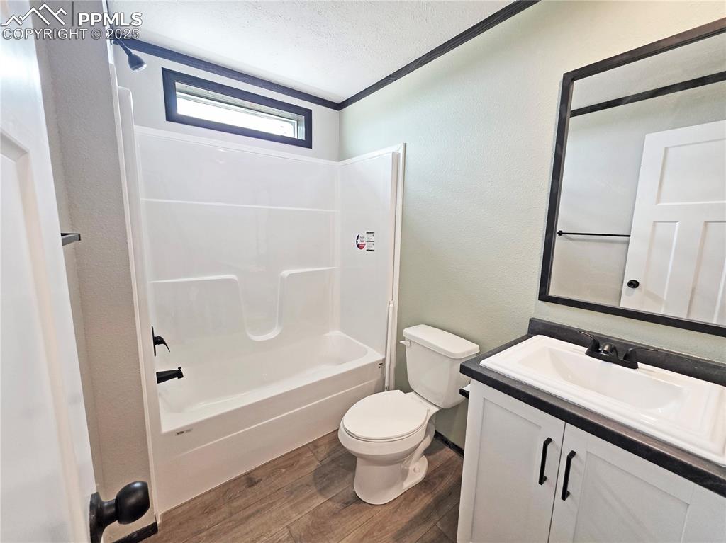 6685 Ramah Highway Yoder, CO 80864 - Photo 23 of 30 a bathroom with a toilet a sink and a bathtub