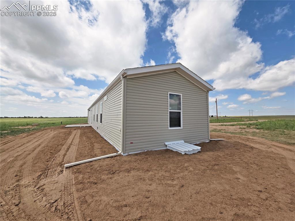 6685 Ramah Highway Yoder, CO 80864 - Photo 4 of 30 a view of a terrace with sky view