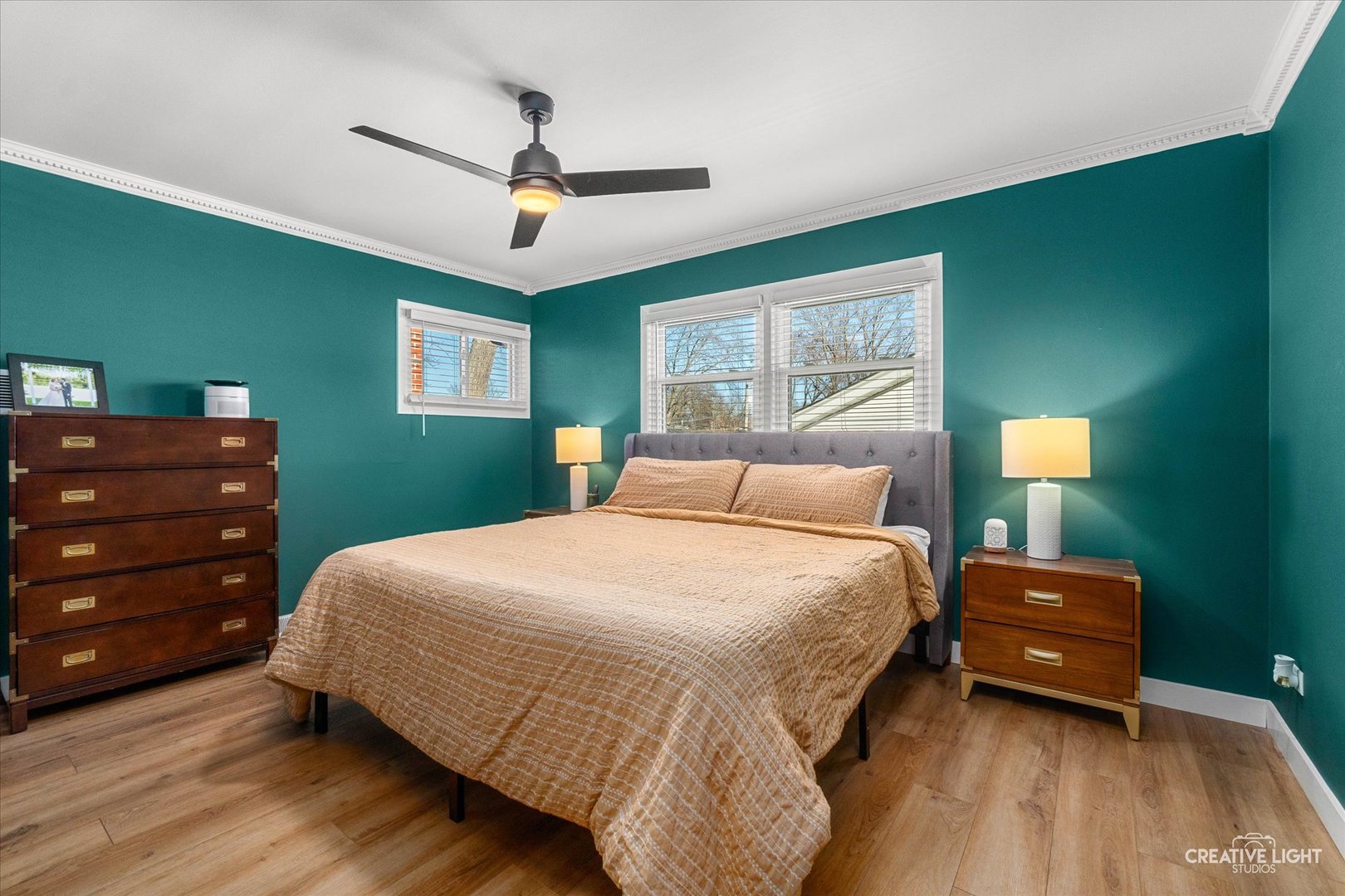 545 Gordon Drive Crete, IL 60417 - Photo 12 of 24 a bedroom with a bed and a dresser