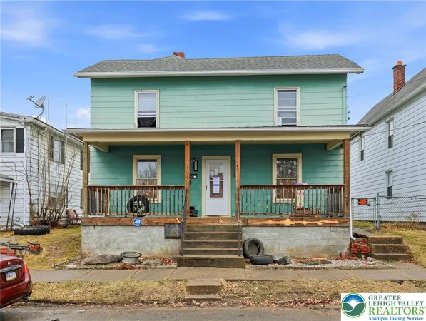 a view of a balcony with wooden floor