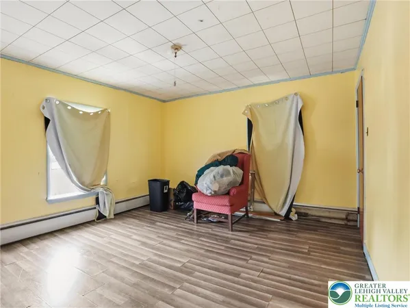 a bathroom with a sink a mirror and a shower