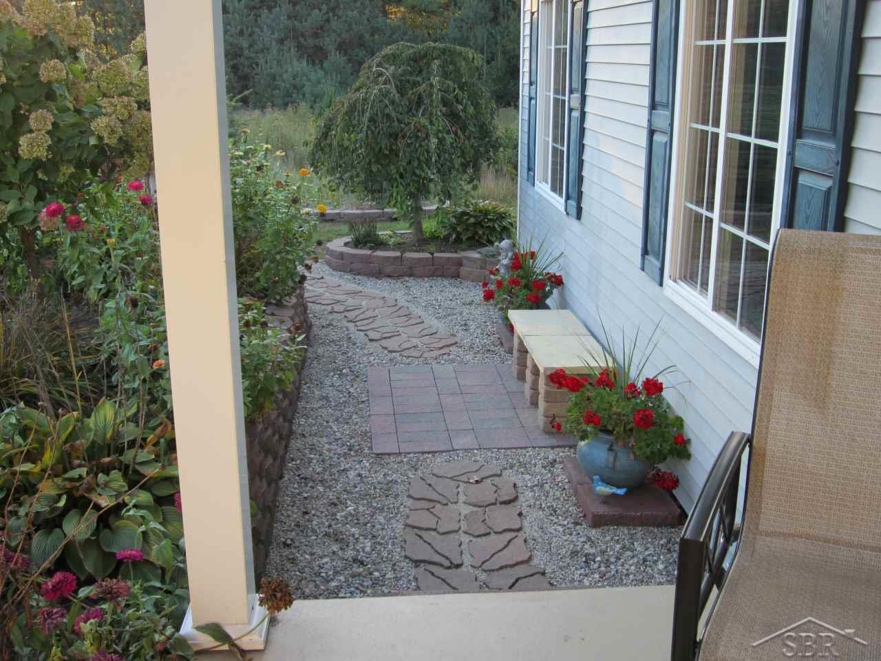 11820 Prior Road St. Charles, MI 48655 - Photo 42 of 43 Lovely sitting area by the front porch