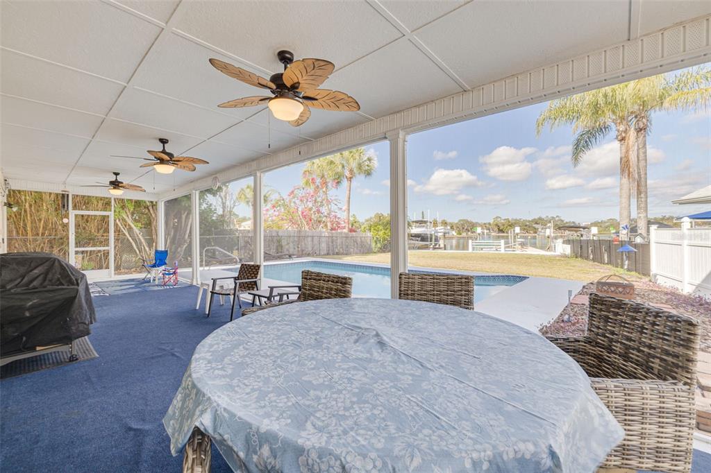 5531 Manatee Point Drive New Port Richey, FL 34652 - Photo 16 of 61 a living room with furniture and a large window