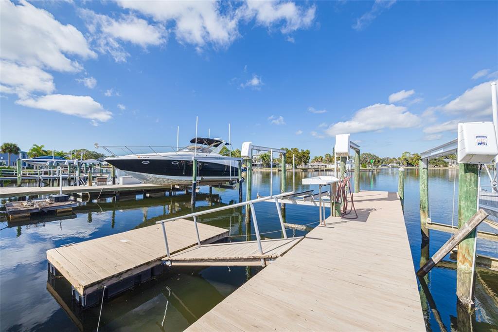 5531 Manatee Point Drive New Port Richey, FL 34652 - Photo 24 of 61 a view of a terrace with sitting area