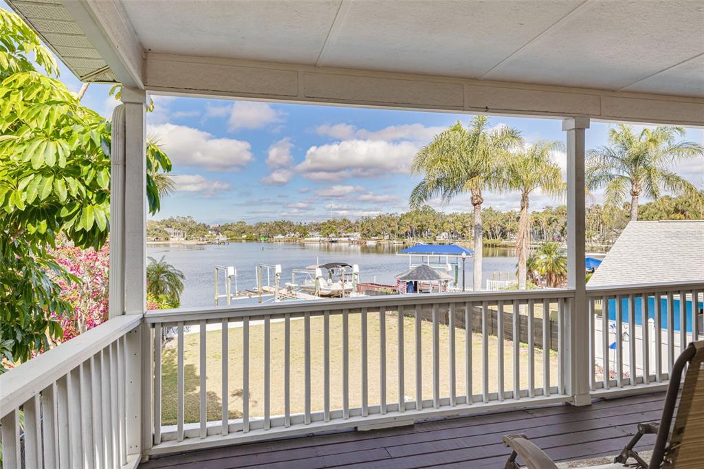 5531 Manatee Point Drive New Port Richey, FL 34652 - Photo 32 of 61 a view of a large window with wooden floor