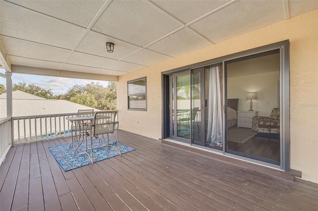 5531 Manatee Point Drive New Port Richey, FL 34652 - Photo 34 of 61 a view of a room with wooden floor and iron floor