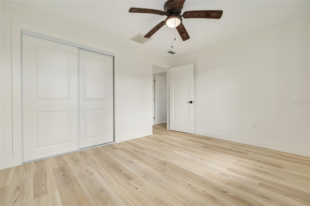 5531 Manatee Point Drive New Port Richey, FL 34652 - Photo 47 of 61 wooden floor in an empty room