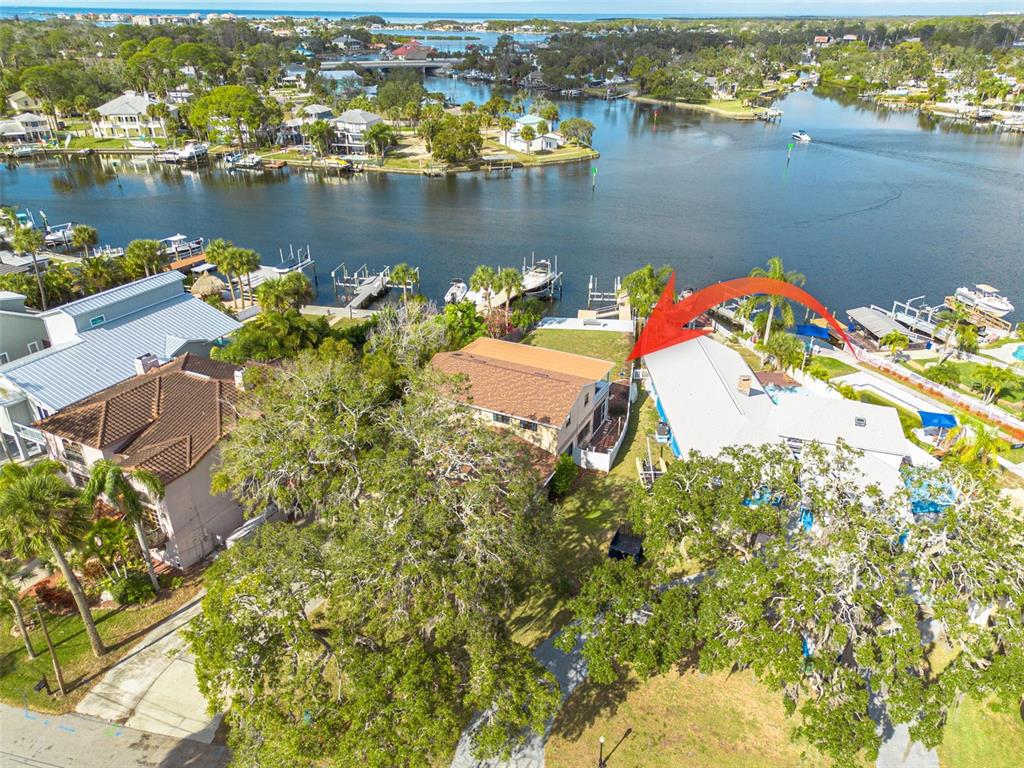 5531 Manatee Point Drive New Port Richey, FL 34652 - Photo 53 of 61 an aerial view of a houses with a lake view