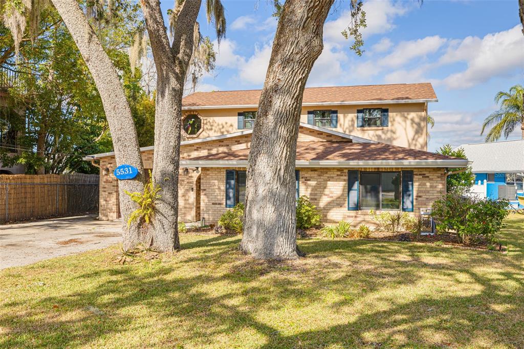 5531 Manatee Point Drive New Port Richey, FL 34652 - Photo 55 of 61 a view of a house with basketball court