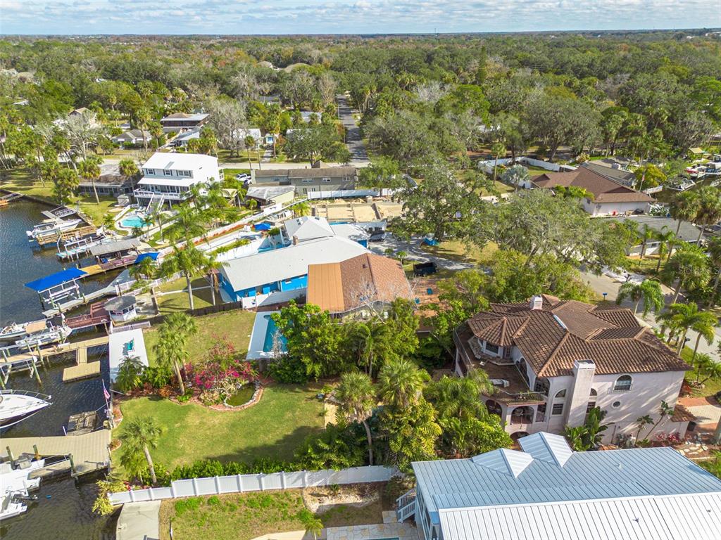 5531 Manatee Point Drive New Port Richey, FL 34652 - Photo 56 of 61 an aerial view of residential houses with outdoor space