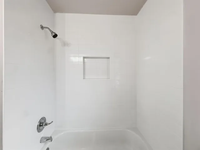 a bathroom with a bathtub