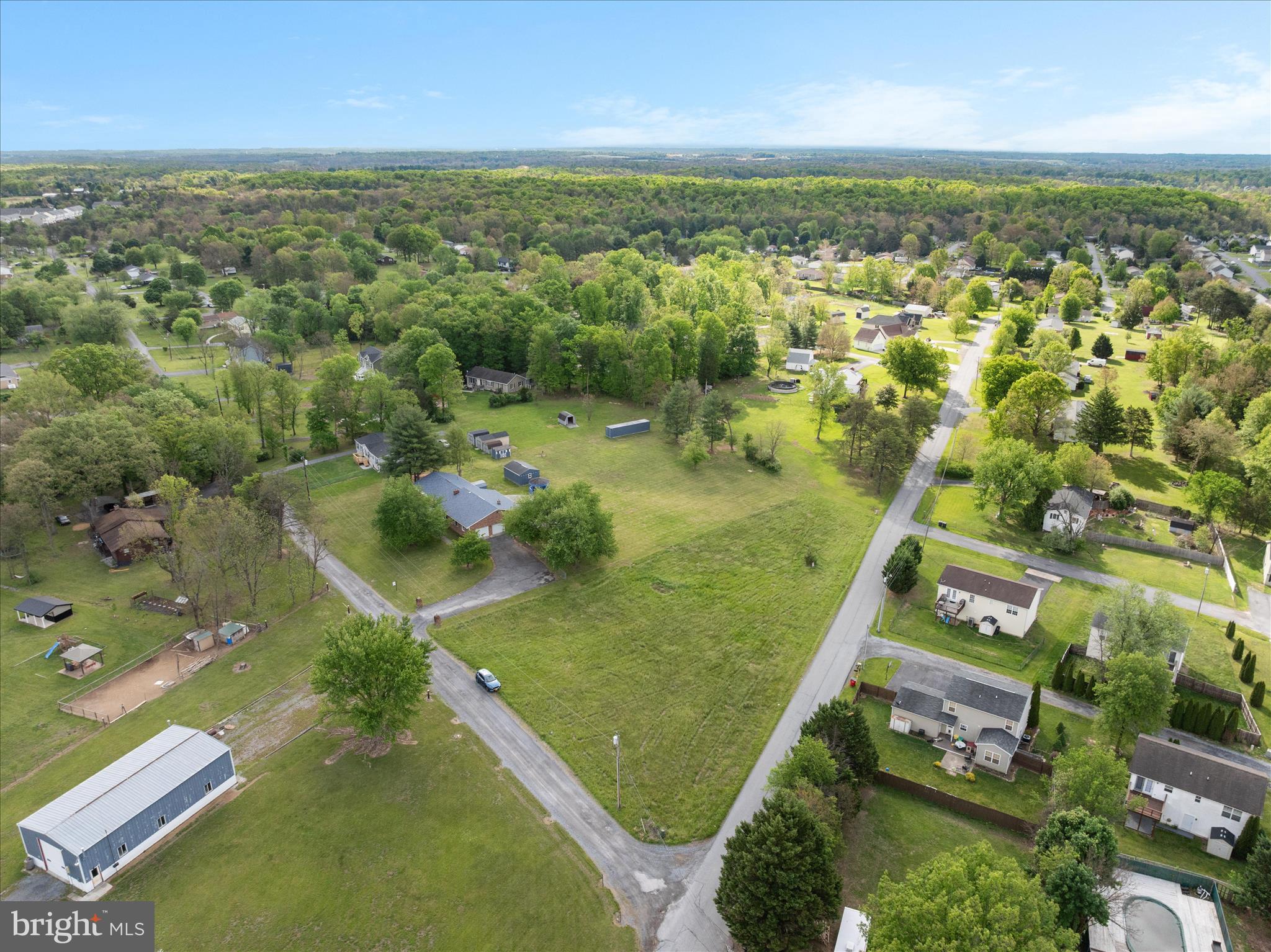 64 Shickle Lane Inwood, WV 25428 - Photo 42 of 42 an aerial view of residential houses with outdoor space