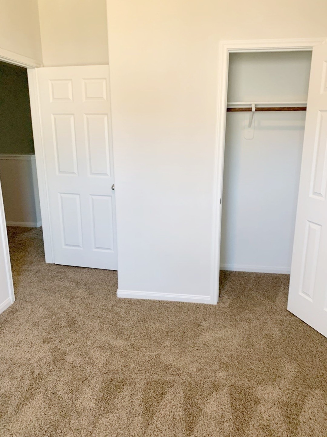 8229 Madera Road, Unit B Houston, TX 77078 - Photo 14 of 18 an empty room with closet and mirror