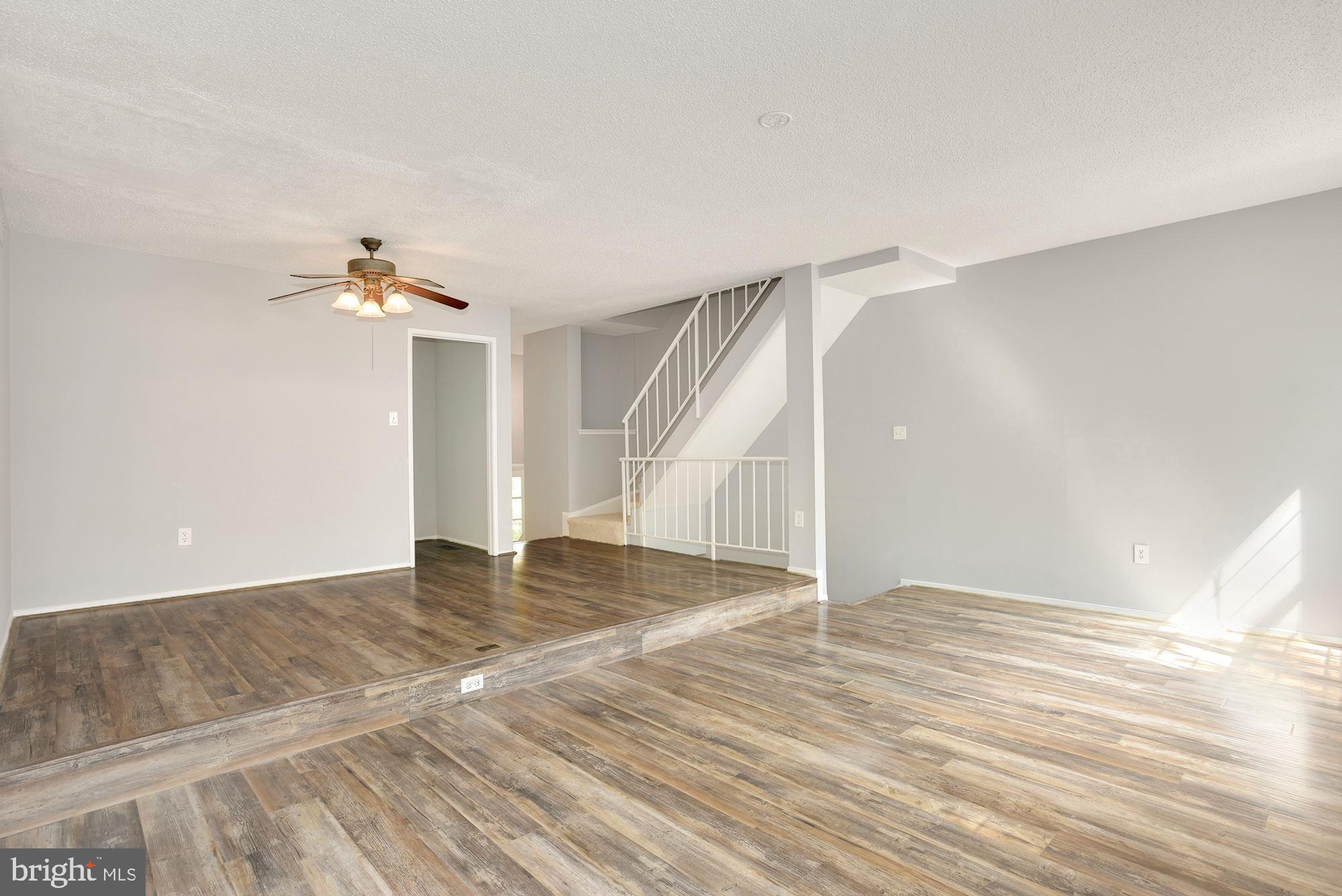 2351 Hunters Square Court Reston, VA 20191 - Photo 2 of 29 Living room flooded with natural light